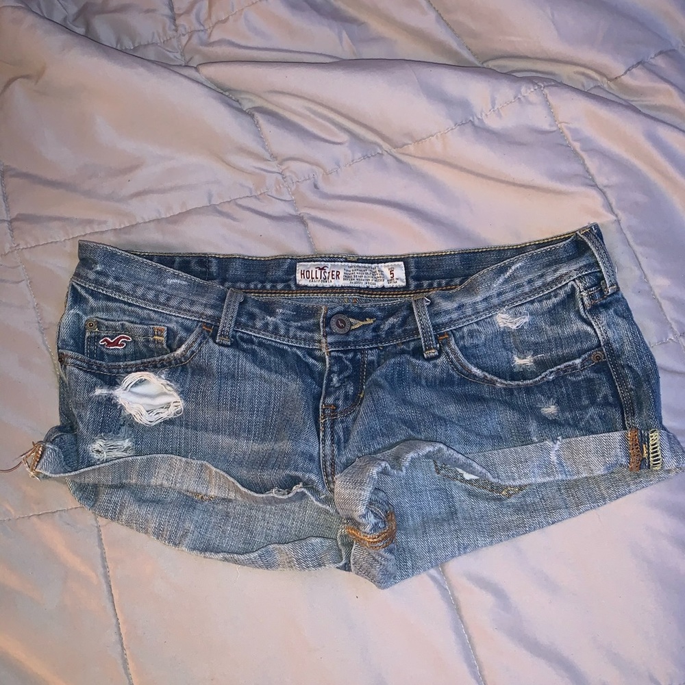 Low rise Hollister ripped shorts with cuffed legs